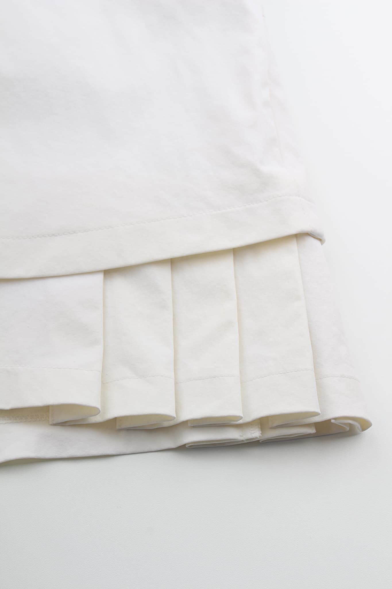 큐롯 플리츠 스커트