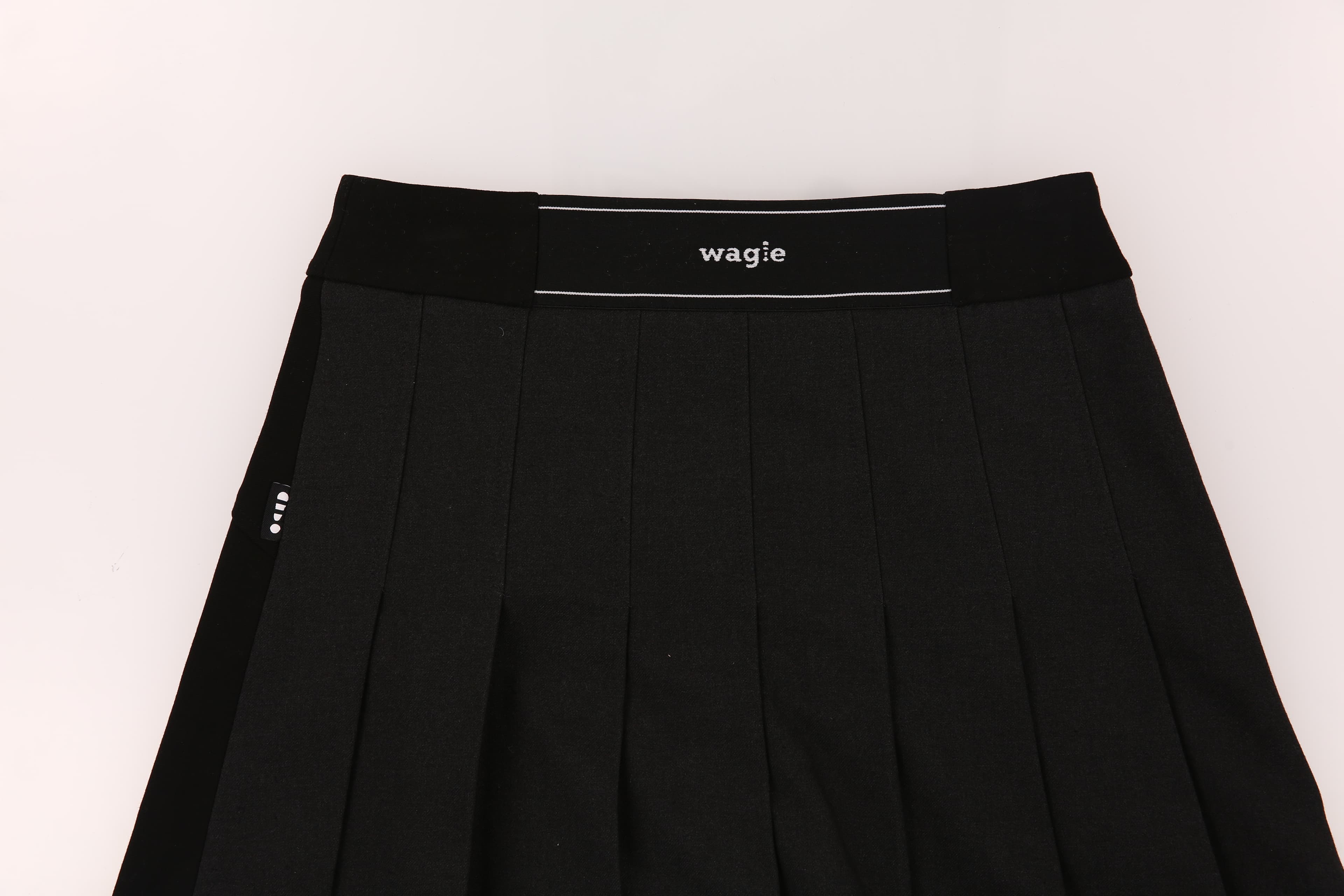 로고밴드 플리츠 스커트